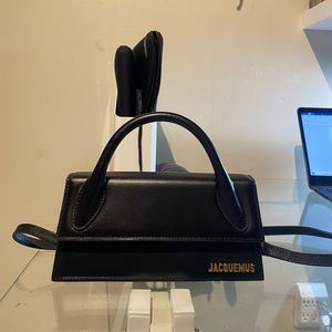 Jacquemus La Montagne ‘le chiquito long’ Clutch in black